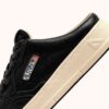 MEDALIST MULE SNEAKERS IN BLACK NAPA LEATHER