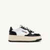 MEDALIST PLATFORM SNEAKERS IN WHITE AND BLACK LEATHER