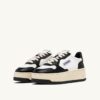MEDALIST PLATFORM SNEAKERS IN WHITE AND BLACK LEATHER