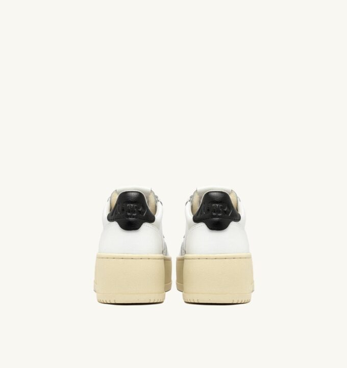 MEDALIST PLATFORM SNEAKERS IN WHITE AND BLACK LEATHER