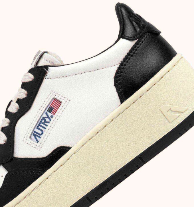 MEDALIST PLATFORM SNEAKERS IN WHITE AND BLACK LEATHER
