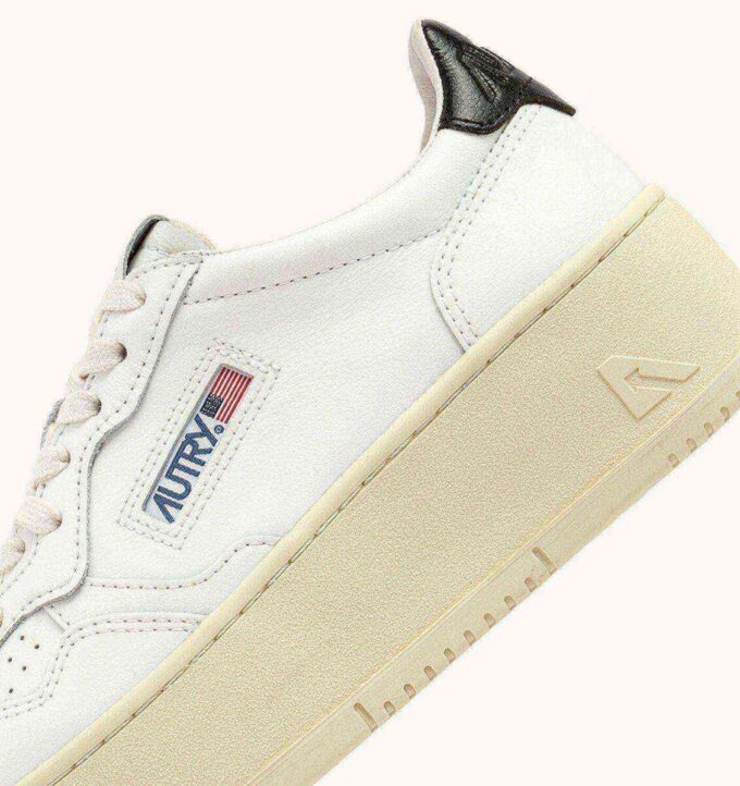 MEDALIST PLATFORM SNEAKERS IN WHITE AND BLACK LEATHER