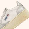 MEDALIST PLATFORM SNEAKERS IN WHITE AND SILVER LEATHER